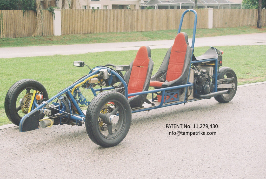 Two Seater Photo of Complete Trike Motorcycle with Patent Number 11,279,430 & contact email info@tampatrike.com