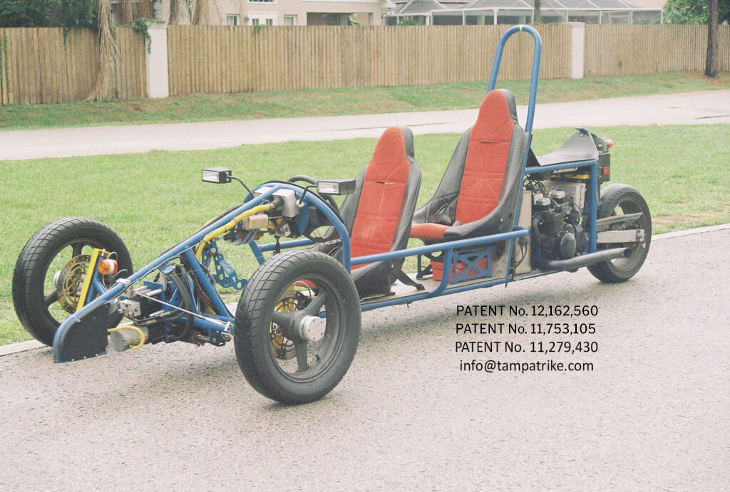 Two Seater Photo of Complete Trike Motorcycle with Patent Number 11,279,430 US 11,753,105 & US 12,162,560 & contact email info@tampatrike.com